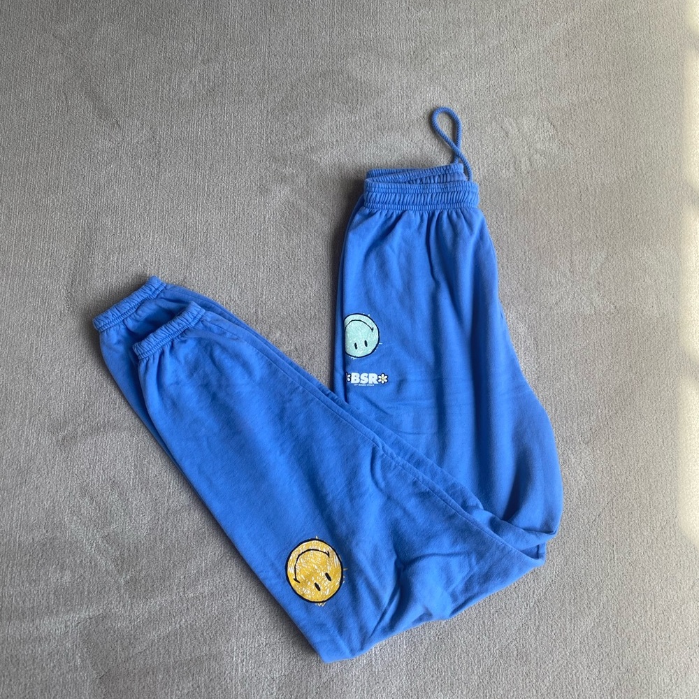 Smiley Good For You sweatpants in blue by Samii ryan